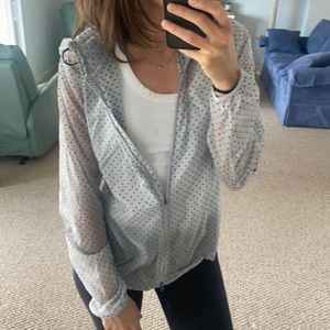 LIKE NEW Nike transparent rain jacket.